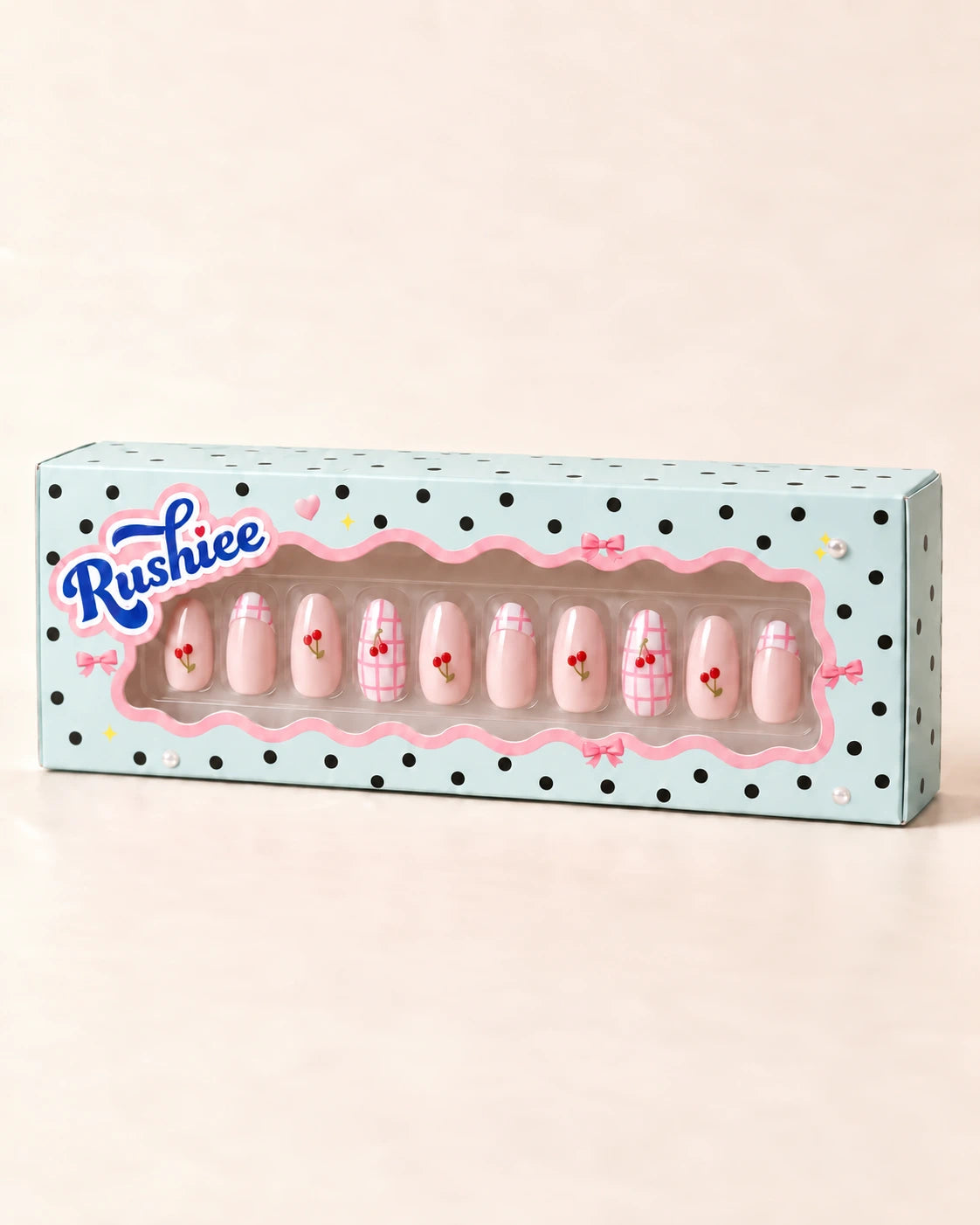 Cherry Picnic press-on nails in Rushiee Pantone 317 C mint packaging